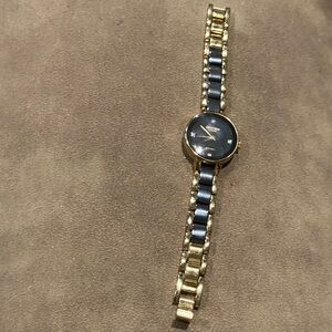 Armitron Black and Gold Ceramic Timepiece